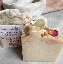 Load image into Gallery viewer, Sea Glass Topped Wildflower Honey Salt Brine Soap 3 oz
